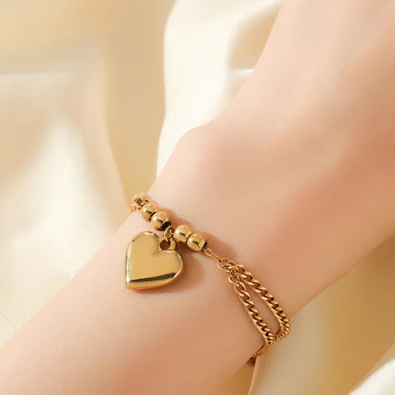 เซ็ตสร้อยคอและกำไลข้อมือจี้หัวใจสีทอง